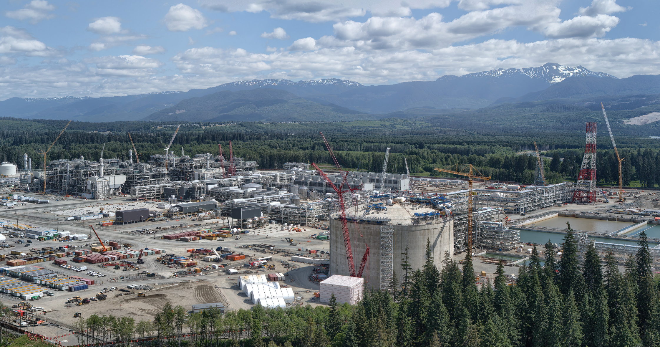 A view of the LNG Canada industrial site with construction equipment and facilities in Kitimat, British Columbia