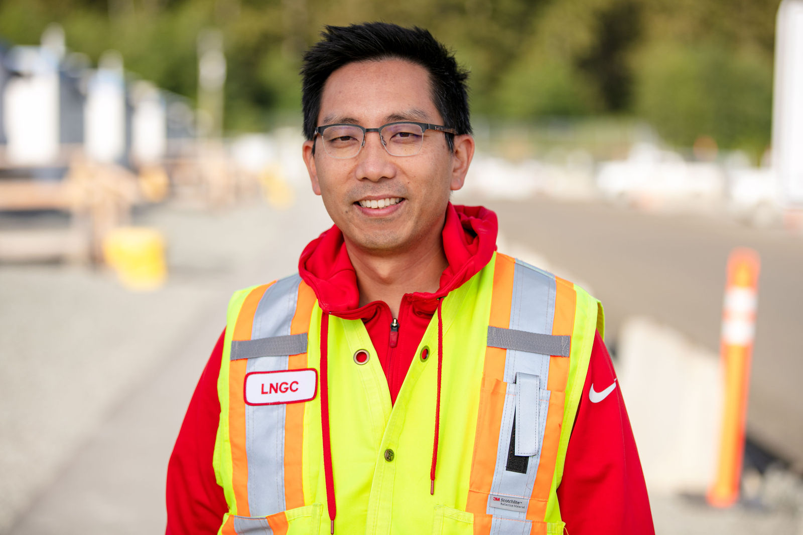 A portrait of a male worker from the LNG Canada team