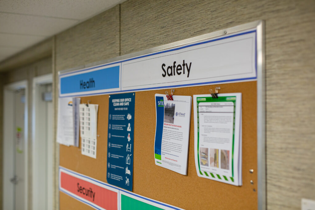 Bulletin board showcasing essential safety and health documents 